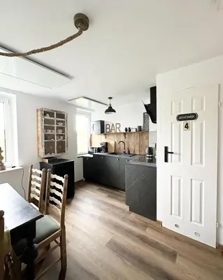 Kuchnia lub aneks kuchenny w obiekcie Apartament Antracytowe Wrota