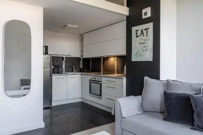 Kuchnia lub aneks kuchenny w obiekcie RentPlanet - Apartament Matejki