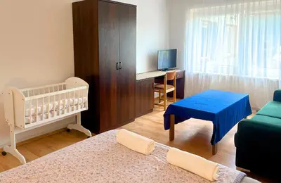 Łóżko lub łóżka w pokoju w obiekcie Biwak Bajlando