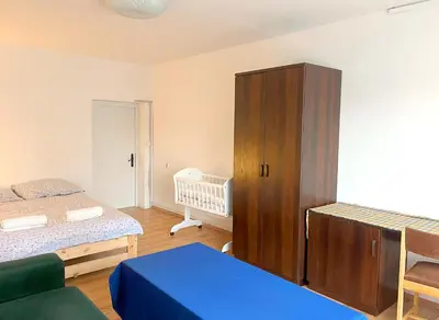 Łóżko lub łóżka w pokoju w obiekcie Biwak Bajlando