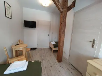 Telewizja i/lub zestaw kina domowego w obiekcie Derkaczowa Kotlina