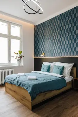 Łóżko lub łóżka w pokoju w obiekcie Apartament Rynek Kielbasnicza