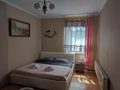 Łóżko lub łóżka w pokoju w obiekcie Apartament Pod Wiaduktem