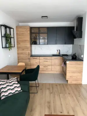 Kuchnia lub aneks kuchenny w obiekcie Słoneczny Apartament