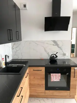 Kuchnia lub aneks kuchenny w obiekcie Słoneczny Apartament