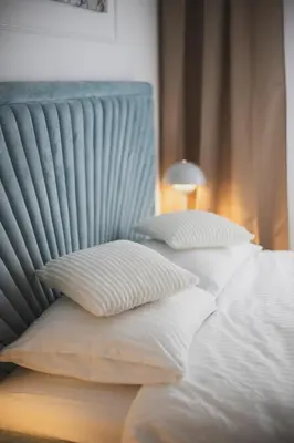 Łóżko lub łóżka w pokoju w obiekcie Dan Apartament, Self check-in