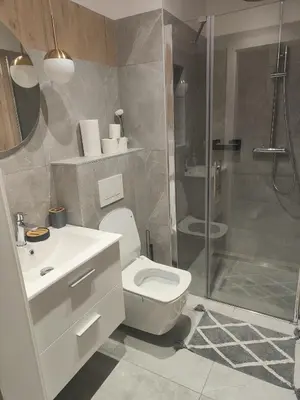 Łazienka w obiekcie Apartament Brzoskwiniowy