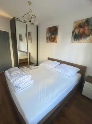 Łóżko lub łóżka w pokoju w obiekcie Pod Wieżą