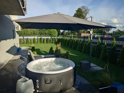 Ogród w obiekcie Aleja Ogrodowa z Jacuzzi
