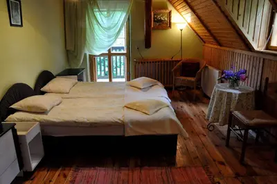 Łóżko lub łóżka w pokoju w obiekcie Agroturystyka Pod Jesionami