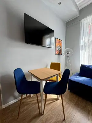 Telewizja i/lub zestaw kina domowego w obiekcie Apartament Filmowy