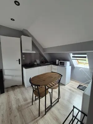 Kuchnia lub aneks kuchenny w obiekcie Apartament na poddaszu