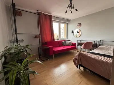 Łóżko lub łóżka w pokoju w obiekcie Stylowe mieszkanie w centrum Opola