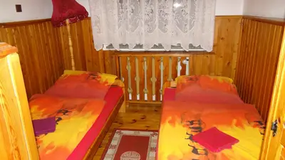 Łóżko lub łóżka w pokoju w obiekcie Ośrodek Wypoczynkowy 