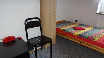 Łóżko lub łóżka w pokoju w obiekcie Ośrodek Wypoczynkowy 