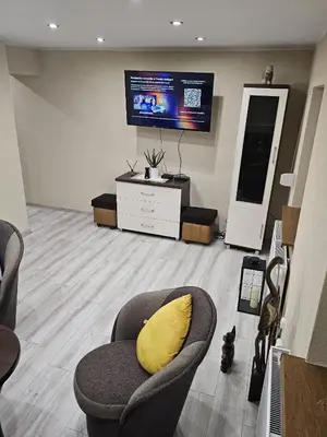 Telewizja i/lub zestaw kina domowego w obiekcie Apartament - Zdrojowy