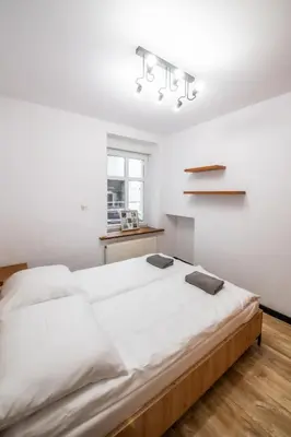 Łóżko lub łóżka w pokoju w obiekcie Apartament Średnia 16