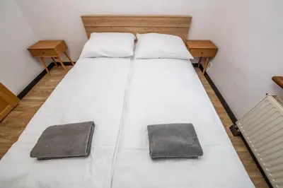Łóżko lub łóżka w pokoju w obiekcie Apartament Średnia 16
