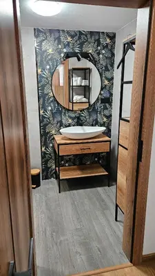 Łóżko lub łóżka w pokoju w obiekcie Apartament ViWaldi bike and ski
