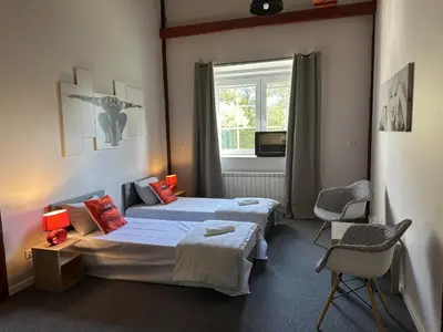 Łóżko lub łóżka w pokoju w obiekcie Młyn Witowice