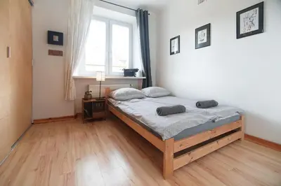 Łóżko lub łóżka w pokoju w obiekcie Apatrament Morawka 19
