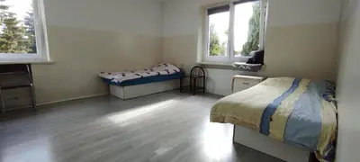 Łóżko lub łóżka w pokoju w obiekcie Adam room 1