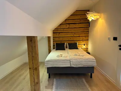 Łóżko lub łóżka w pokoju w obiekcie Apartament Sanatoryjna