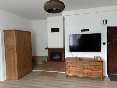 Telewizja i/lub zestaw kina domowego w obiekcie Apartament Sanatoryjna
