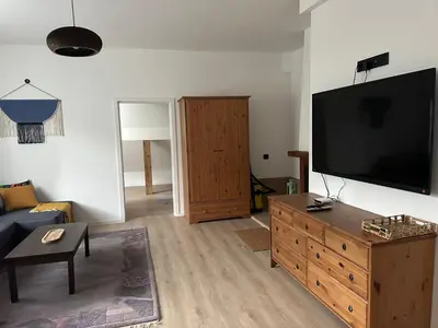 Telewizja i/lub zestaw kina domowego w obiekcie Apartament Sanatoryjna