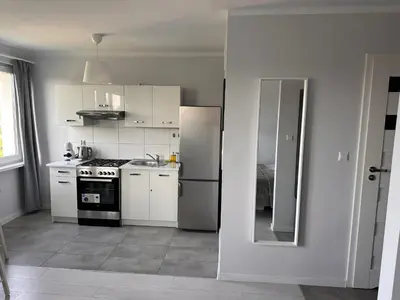 Kuchnia lub aneks kuchenny w obiekcie APARTAMENT OS ZŁOTE 5d