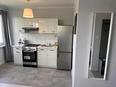 Kuchnia lub aneks kuchenny w obiekcie APARTAMENT OS ZŁOTE 5d