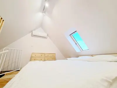 Łóżko lub łóżka w pokoju w obiekcie Garden House Jacuzzi