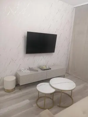 Telewizja i/lub zestaw kina domowego w obiekcie Apartament na Letniej Klimatyzacja