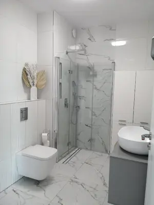 Łazienka w obiekcie Apartament na Letniej Klimatyzacja