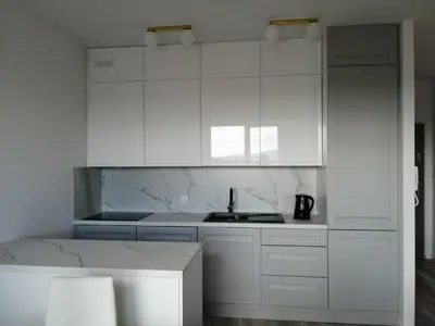 Kuchnia lub aneks kuchenny w obiekcie Apartament na Letniej Klimatyzacja