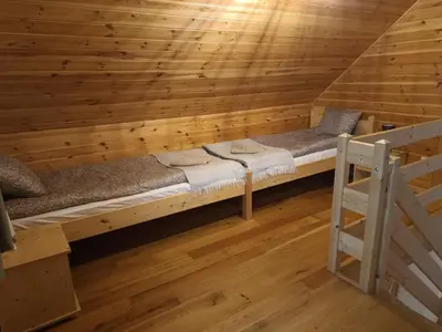 Łóżko lub łóżka w pokoju w obiekcie Apartament Na Rozdrożu