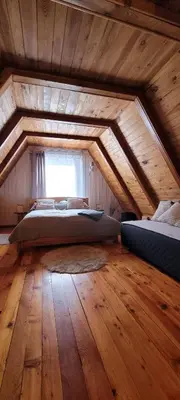 Łóżko lub łóżka w pokoju w obiekcie DOMEK Trzynastka