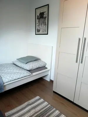 Łóżko lub łóżka w pokoju w obiekcie Lemuria Pokoje Hostel Chojnowska A