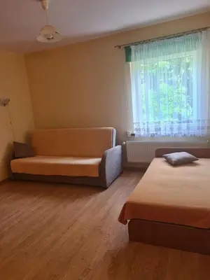 Łóżko lub łóżka w pokoju w obiekcie Noclegi Stara Fabryka Jedlina-Zdrój