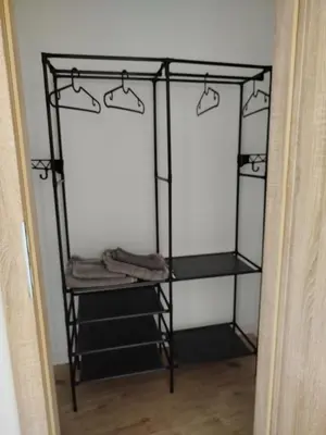 Łóżko lub łóżka piętrowe w pokoju w obiekcie Apartament Eden