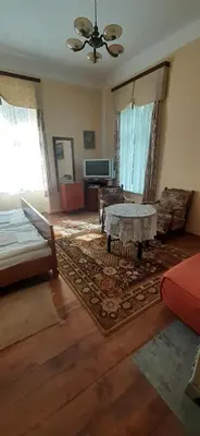 Łóżko lub łóżka w pokoju w obiekcie Pałac Stanica