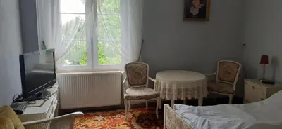 Łóżko lub łóżka w pokoju w obiekcie Pałac Stanica