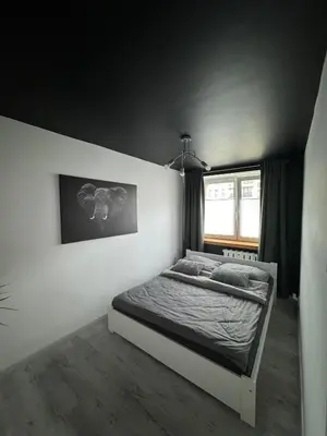 Łóżko lub łóżka w pokoju w obiekcie Apartament NOWE MIASTO