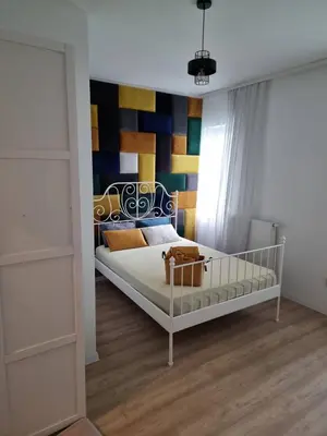 Łóżko lub łóżka w pokoju w obiekcie Apartament GABI