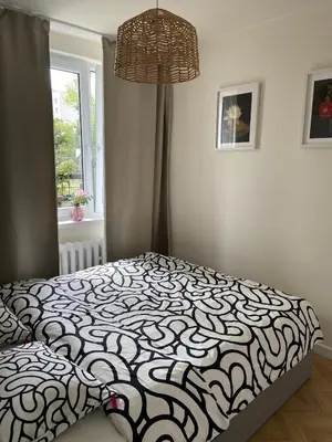 Łóżko lub łóżka w pokoju w obiekcie Perła na Grabiszynie by Apartamenty na dni Wrocław