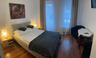 Łóżko lub łóżka w pokoju w obiekcie Willa Dorotka