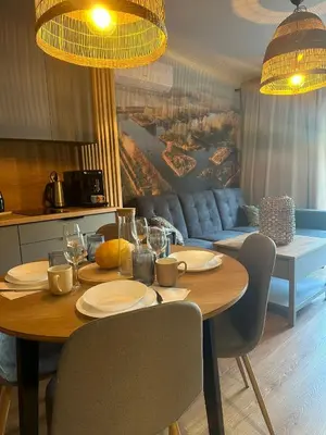 Część wypoczynkowa w obiekcie Apartament 8 z Ogródkiem i Prywatną Sauną, Rowery, Spacery w Dolinie Baryczy - 5D Apartamenty