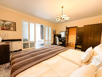 Łóżko lub łóżka w pokoju w obiekcie Calma Apartamenty Kameralne