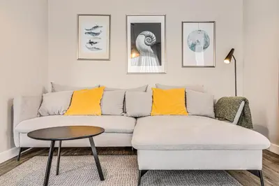 Część wypoczynkowa w obiekcie RentPlanet - Apartament Słonimskiego