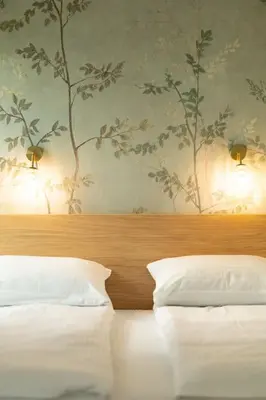 Łóżko lub łóżka w pokoju w obiekcie Apartamenty B URBAN od WroclawApartament-pl